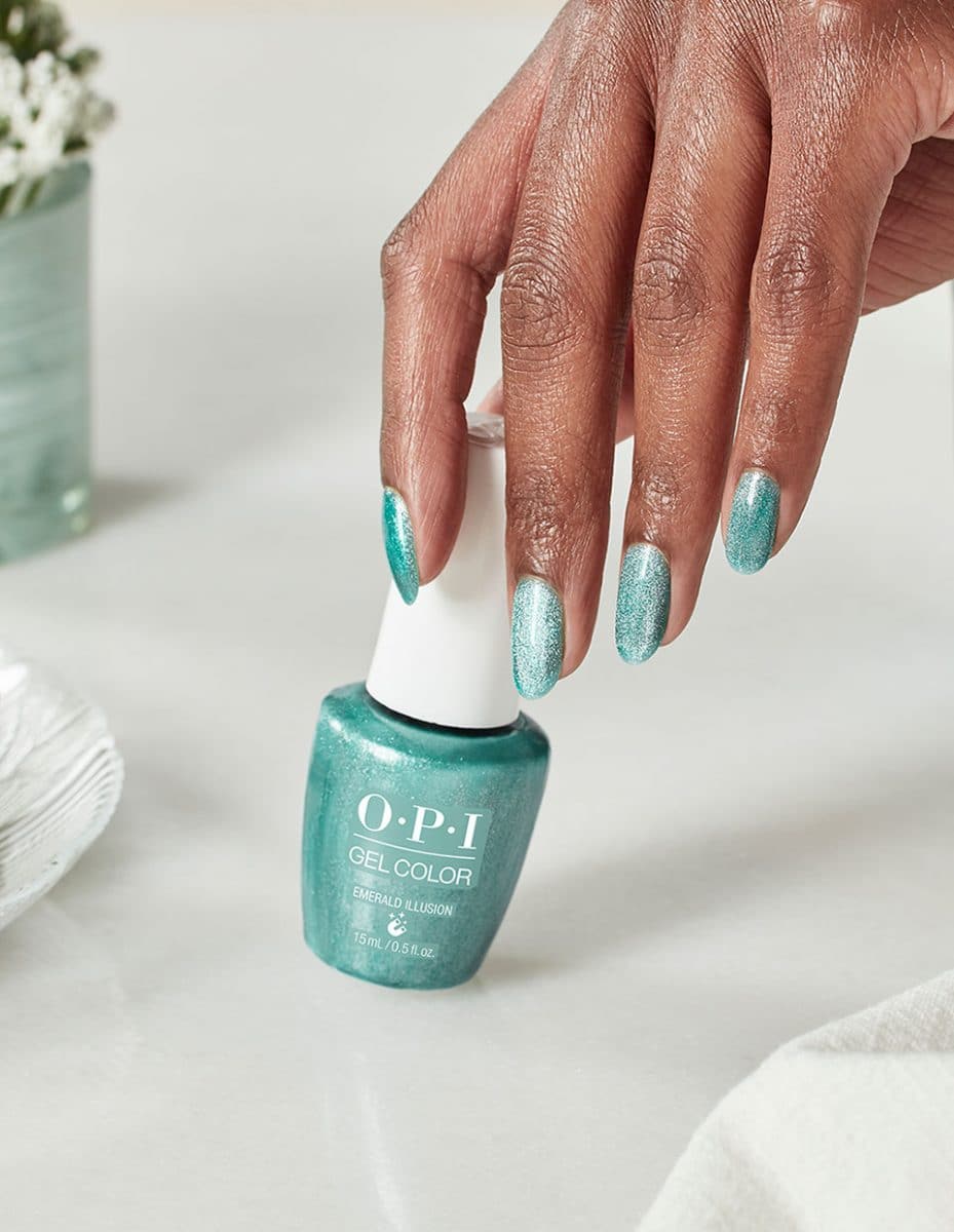 Hand shot for Emerald Illusion nail polish from OPI Velvet Vision Collection