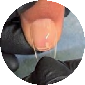 The second step of applying Gelish Soft Gel Tips with the Soft Gel Tip Adhesive In A Tube