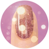 A close-up of a faceless woman's finger on the camera mood painted with the Mesmerized By You shade from the Gelish Flash Glam collection