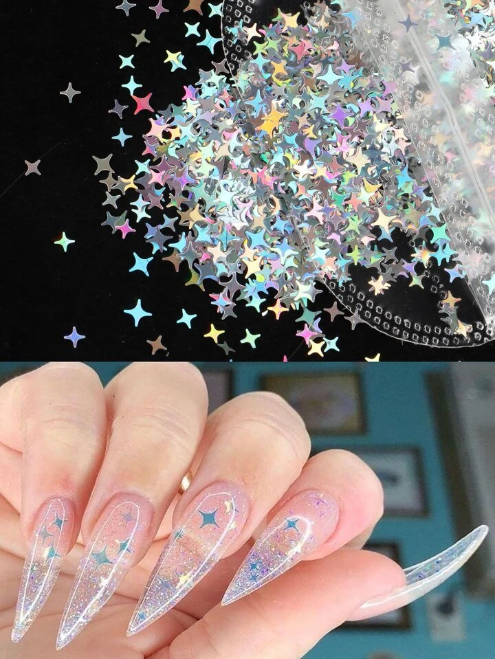 A woman with long stiletto nails with transparent nail tips with stars on them as nail decoration designs. Sub-nail tools.