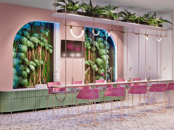 A nail salon with a tropical paradise decoration theme, and plants on the wall