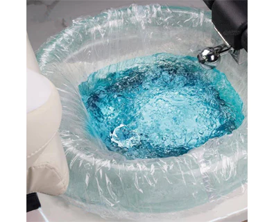 A pedicure bowl with a disposable pedicure liner