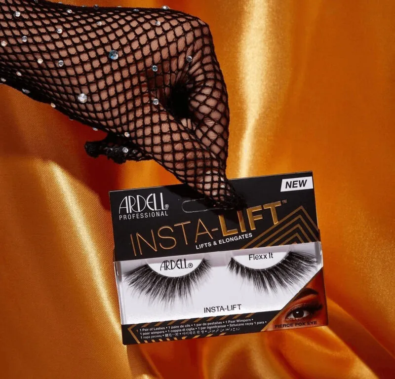 a faceless woman holds the Insta-Lift Lashes from the Ardell brand