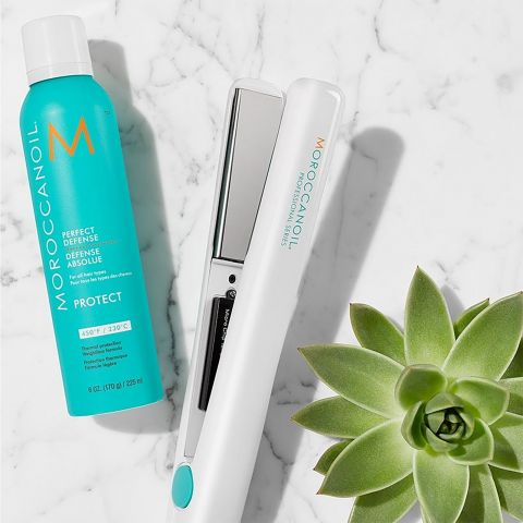 A flat iron and a hair protectant from Moroccanoil