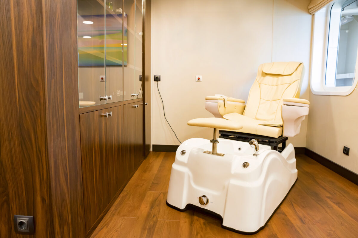 Empty pedicure chair in a spa cabinet on a board of a cruise ship