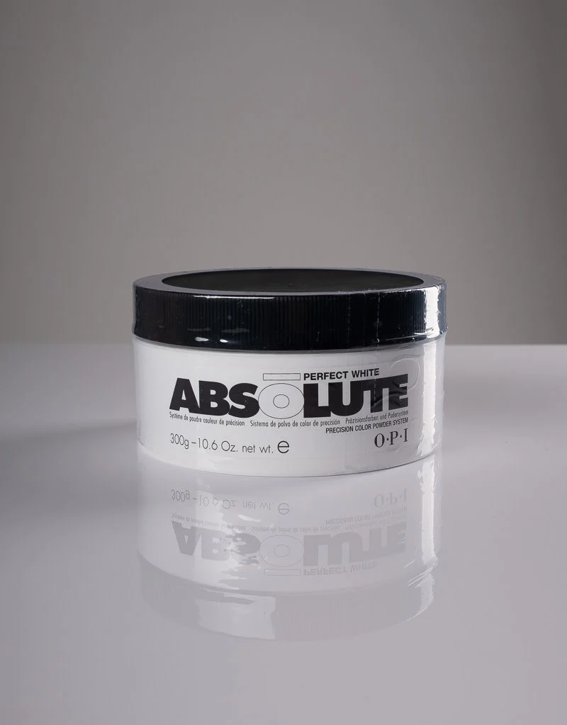 A OPI Absolute Powder container in a white shade