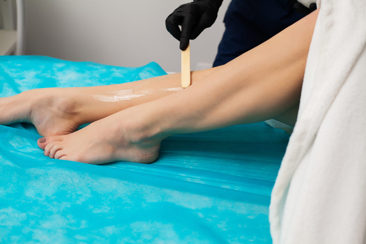 Young Woman Receiving Laser Epilation On Beauty Center
