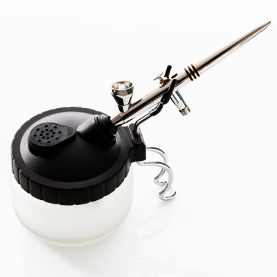 White nail airbrush on a white background.