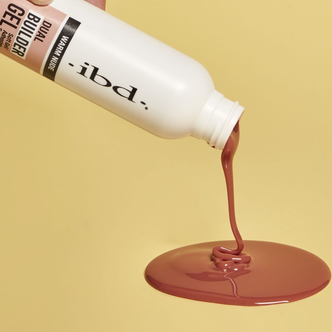 The IBD Dual Builder Gel product in the Warm Nude shade, adark beige shade.