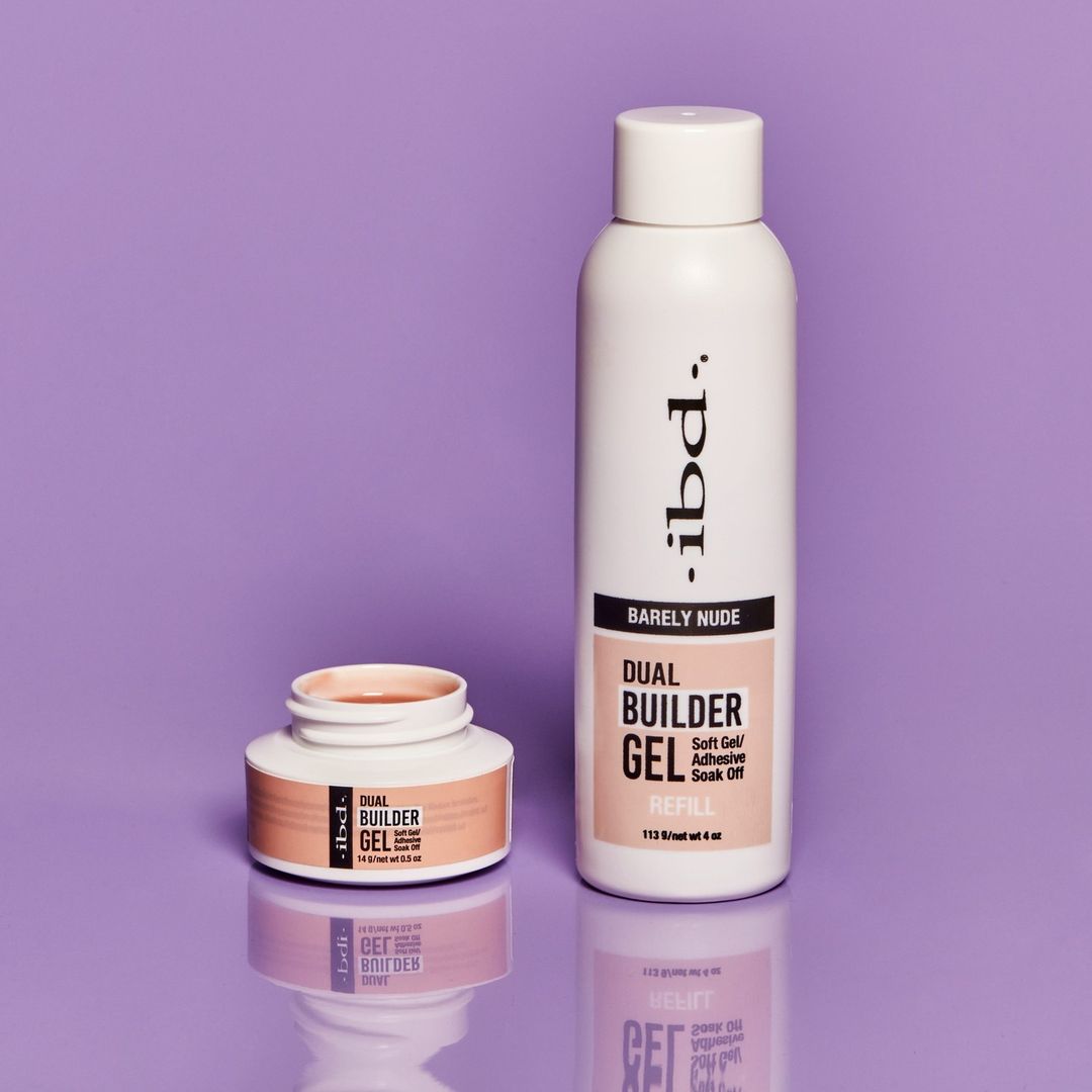 The new IBD Dual Builder Gel product in two different packaging in the barely nude shade on a purple background.