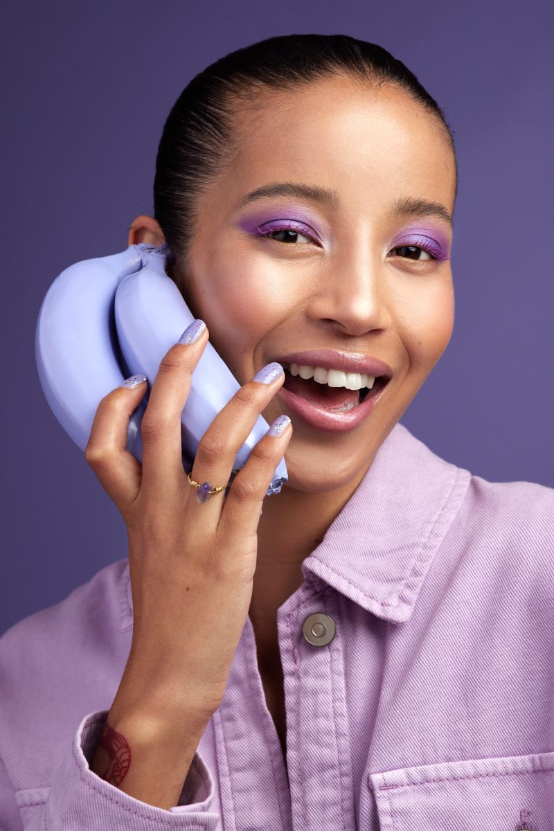 Magic Gel Fall 2024 gel collections. Studio shot of a beautiful young woman modelling a purple color concept.