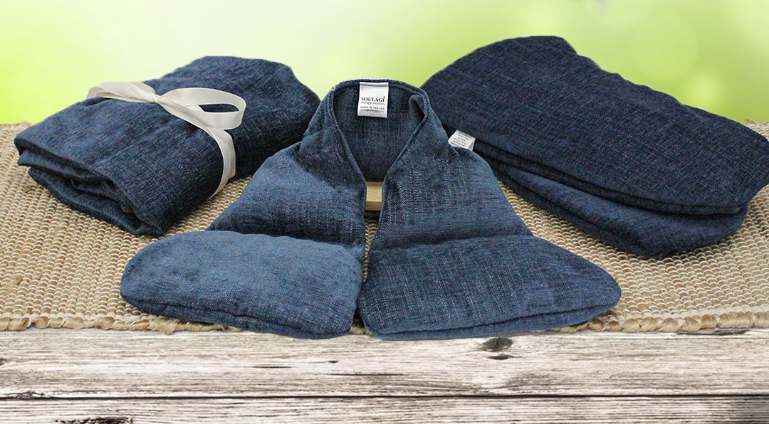 Therabath Comfort Heated Mitts and Insulated Boots, showcasing their luxurious blue chenille fabric. The mitts and boots are designed to provide soothing warmth and comfort, enhanced by the calming scents of clove and orange peel for a relaxing experience.
