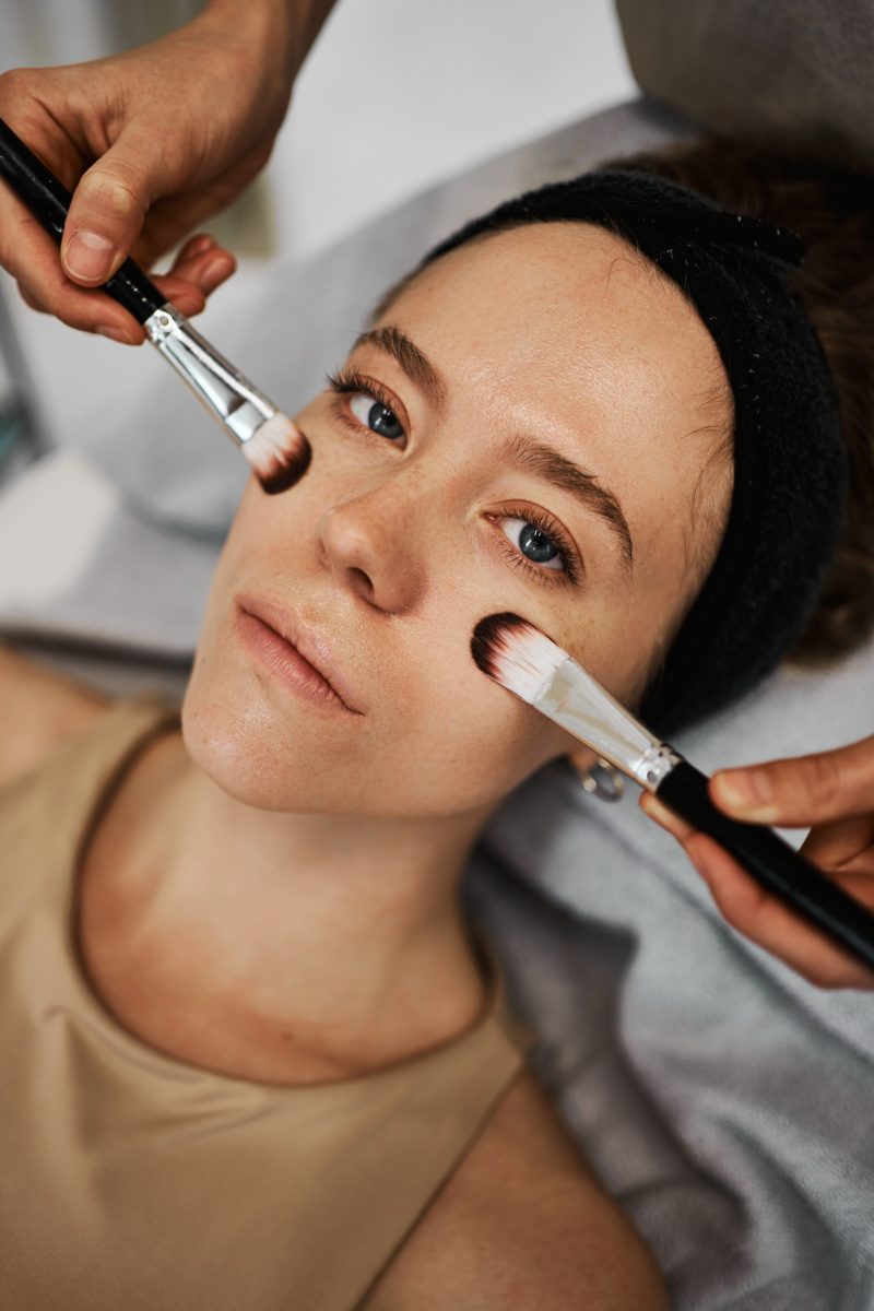 Face massage with brushes. High quality photo. Skincare courses.