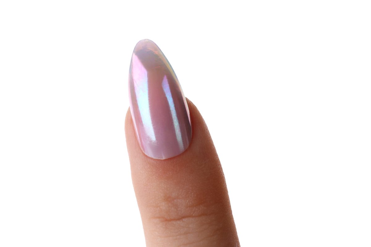 Female finger with manicure isolated on white background