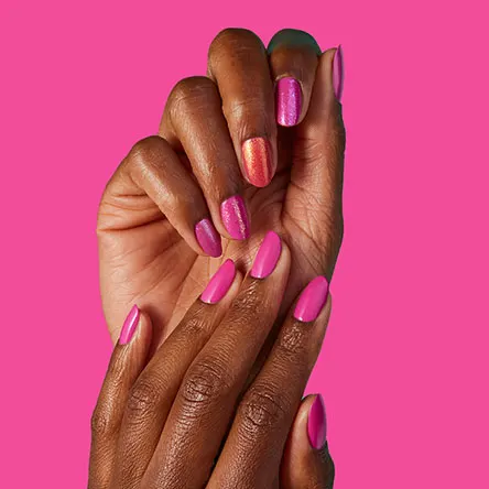 A faceless woman painted her nails using OPI gel polish in pink shade,