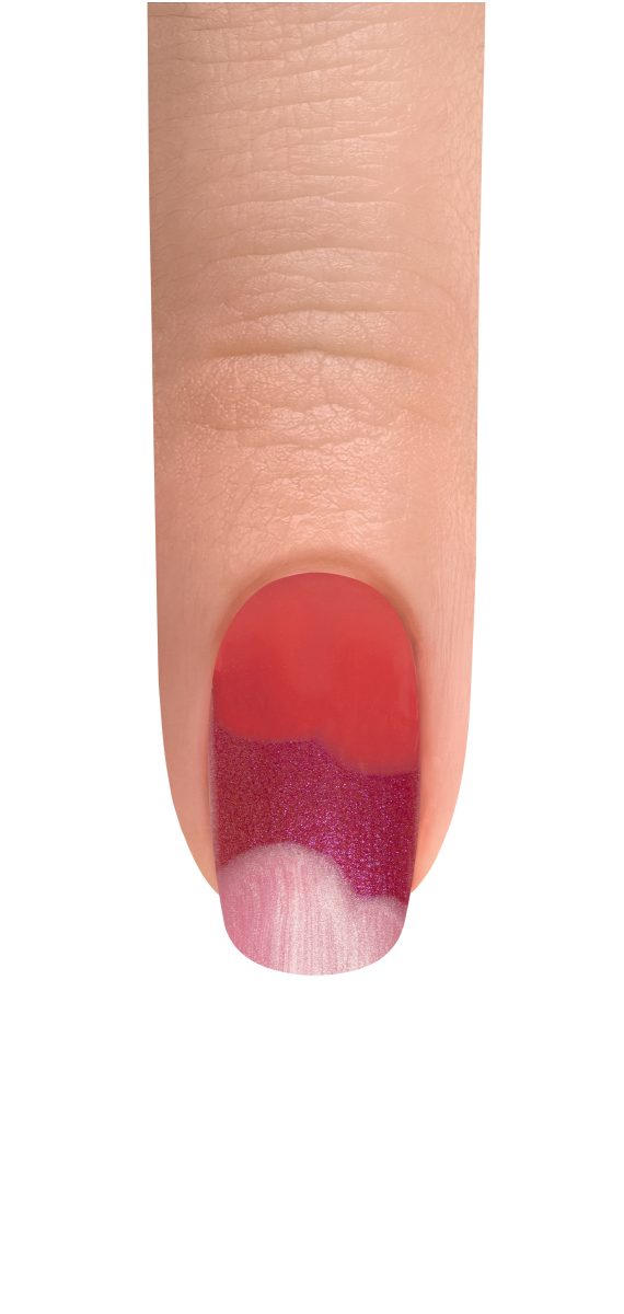 Colorful painted nails. Pink, red, and white painted nail