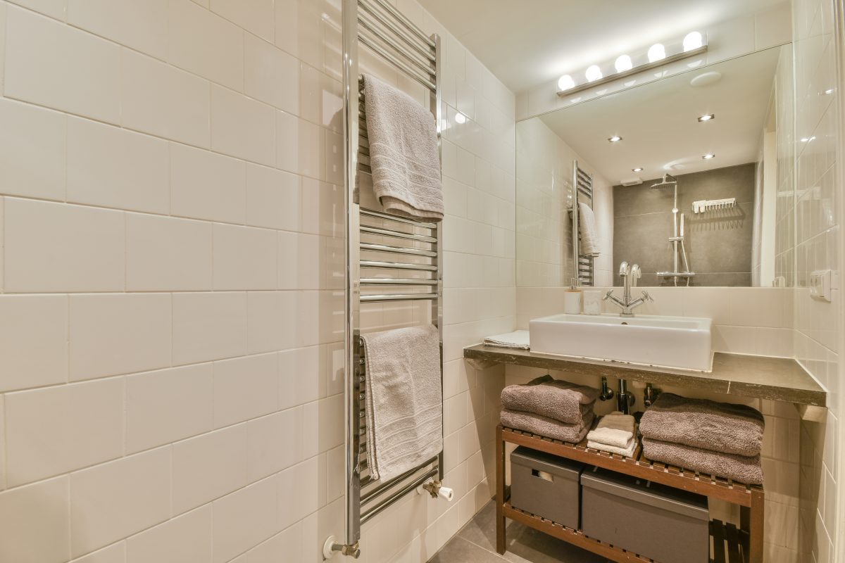Bright elegant bathroom interior in a luxury house. Best Practices for Maintenance and Hygiene