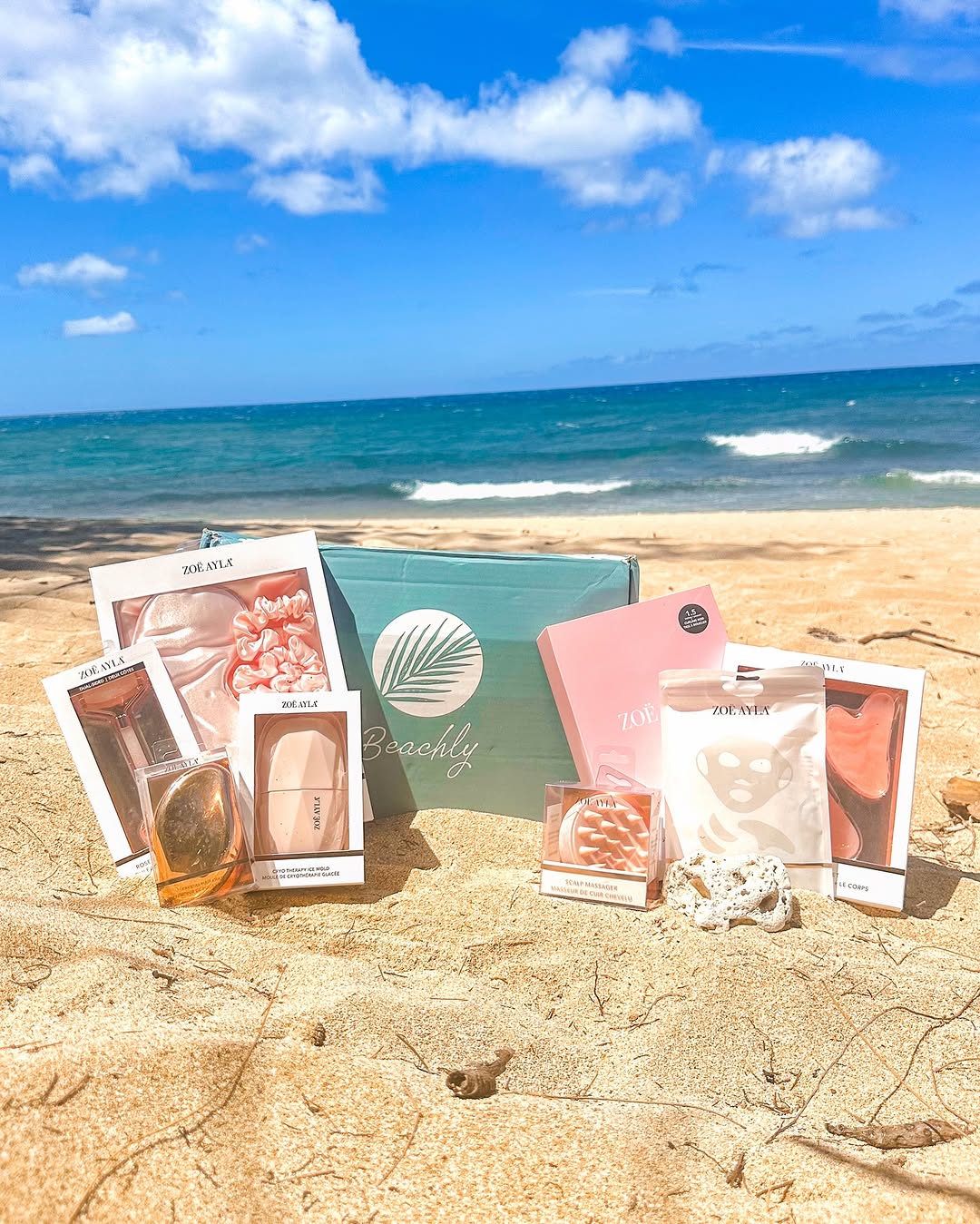 Zoe Ayla products. An assortment of Zoë Ayla products, including beauty tools such as facial rollers, skincare items, and accessories, displayed elegantly. The arrangement emphasizes the brand's aesthetic appeal, with vibrant colors and sleek designs showcased in a visually pleasing composition.