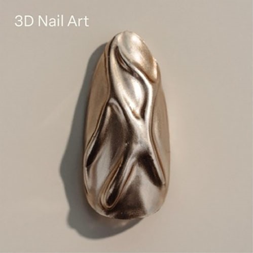 A single nail painted with a metallic chrome polish from the Apres Silk Cover Collection, featuring intricate 3D nail art. The design includes raised, flowing patterns that create a textured and dynamic appearance. The nail is set against a neutral backdrop with the text "3D Nail Art" written in the corner, showcasing the bold and artistic possibilities of the Apres Silk Cover polish.