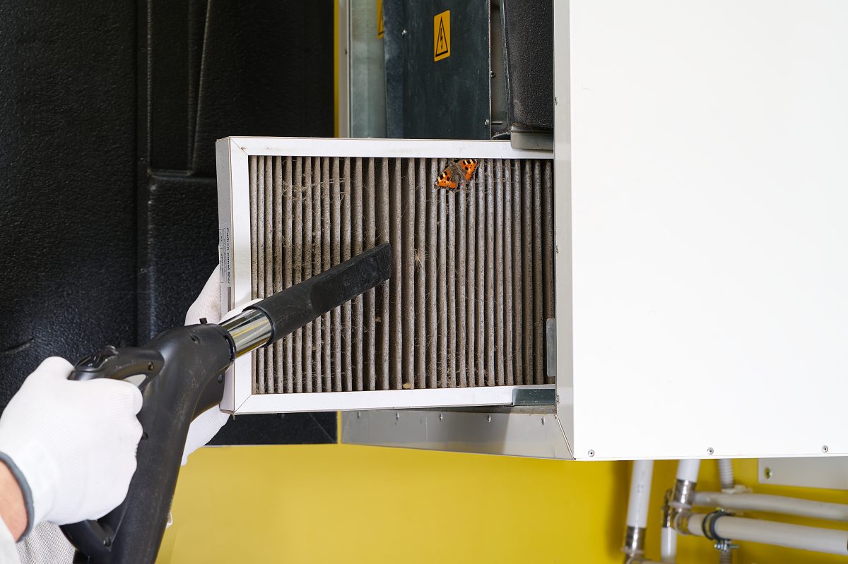 hvac filter replacing. Replacing the filter in the central ventilation system, furnace. Replacing Dirty Air filter for home central air conditioning system. Change filter in rotary heat exchanger recuperator.