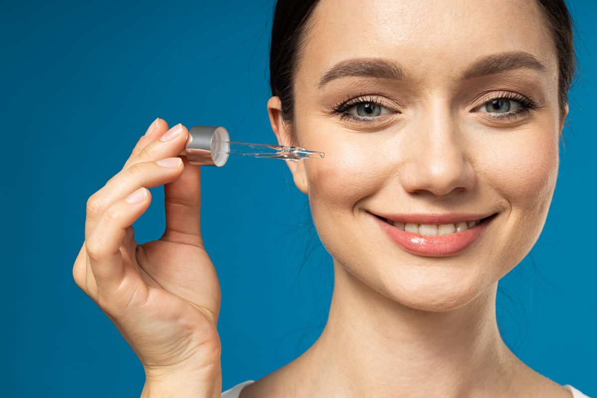 Concept of beauty, face care and skin care with young beautiful woman