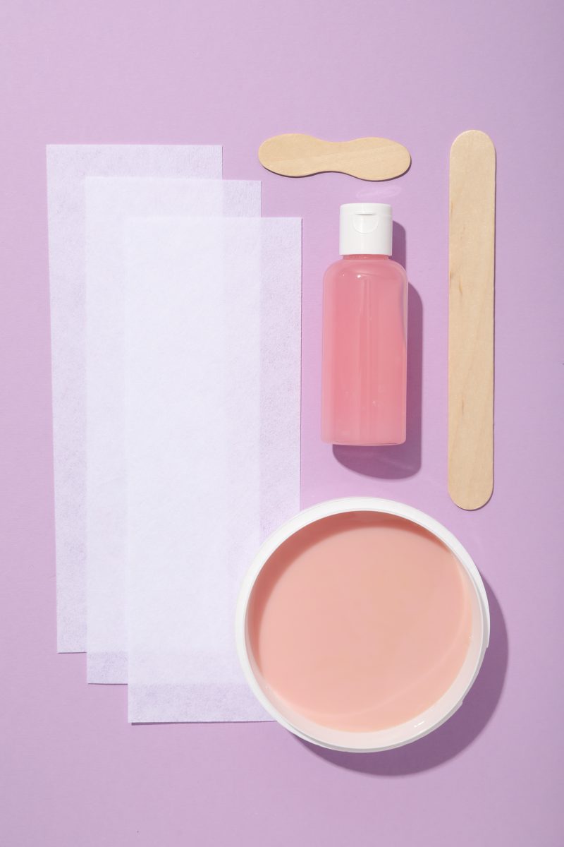 Retail kits for salons. Strips for depilation with liquid wax in a bowl.