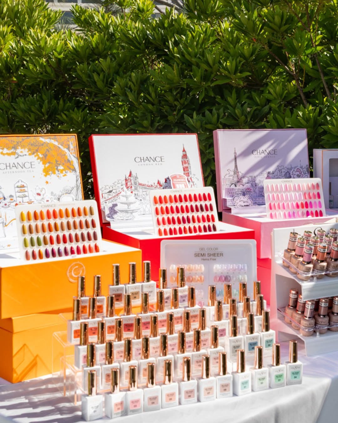 Chance Creation Collections gel polish kits for nail salons: Afternoon Tea, London Red, and Pink Iconic 48-color sets. Image shows full displays with gel polish bottles and color charts, perfect for professional nail technicians.