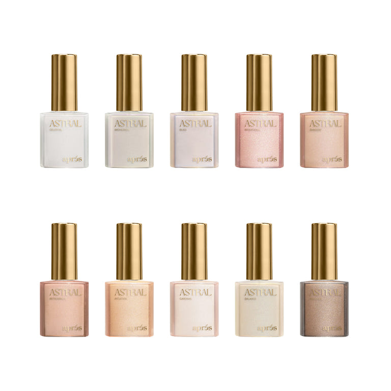 A set of 10 Apres Astral Gel Couleur Pearlescent nail polish bottles, showcasing the soft ethereal finish in white, nude, and warm beige shades, ideal for professional salon use.
