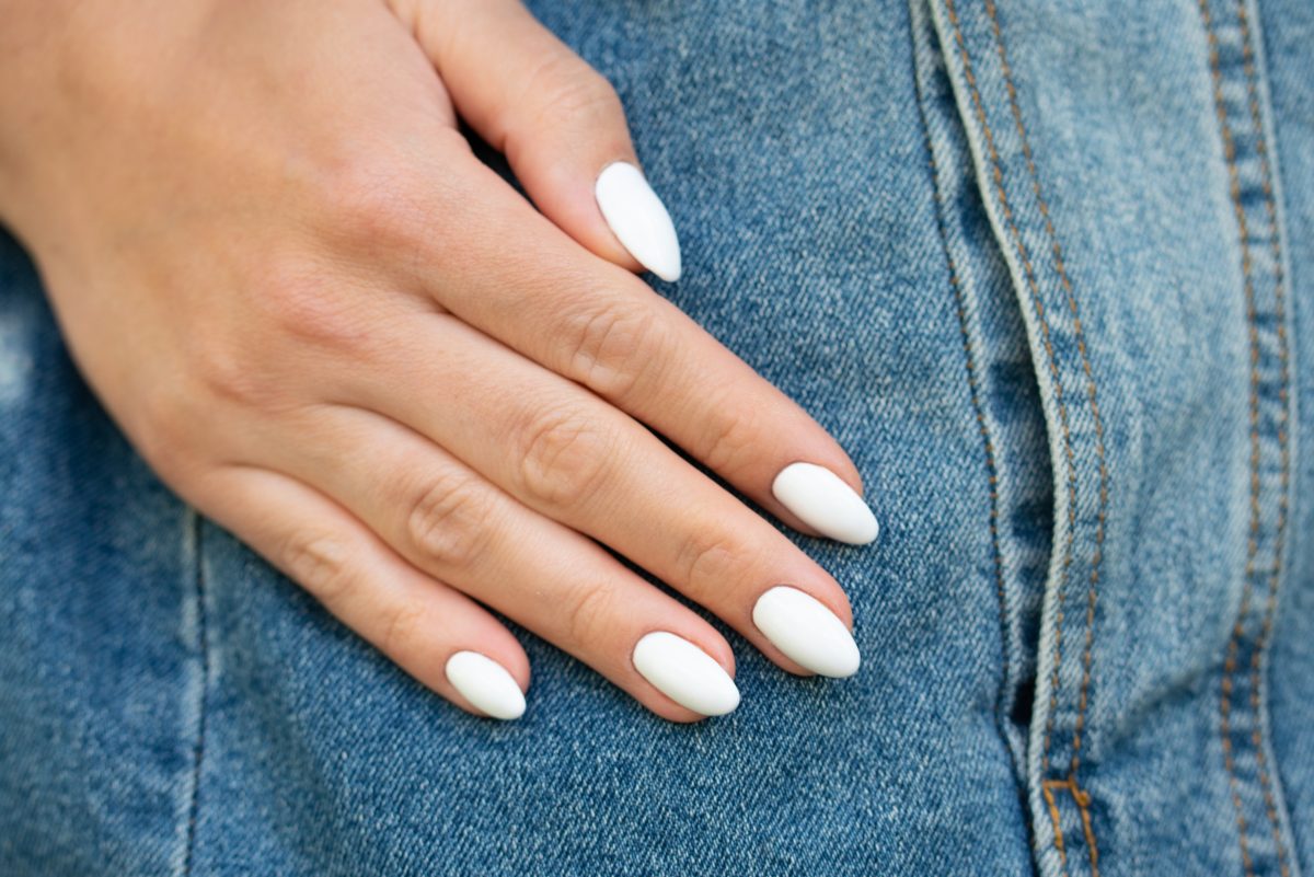 Short almond nails white polish casual everyday look 2025 denim jacket practical durable nail shape.
