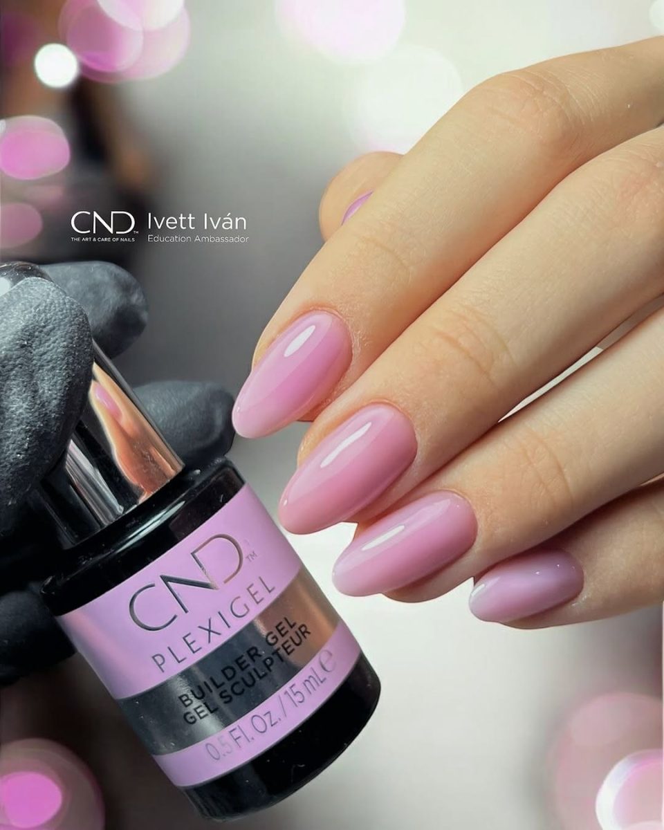 Mauve pink builder gel manicure by CND Education Ambassador Ivett Iván. Glossy oval-shaped gel nails shown with the CND Plexigel Builder Gel bottle. CND PLEXIGEL Application.