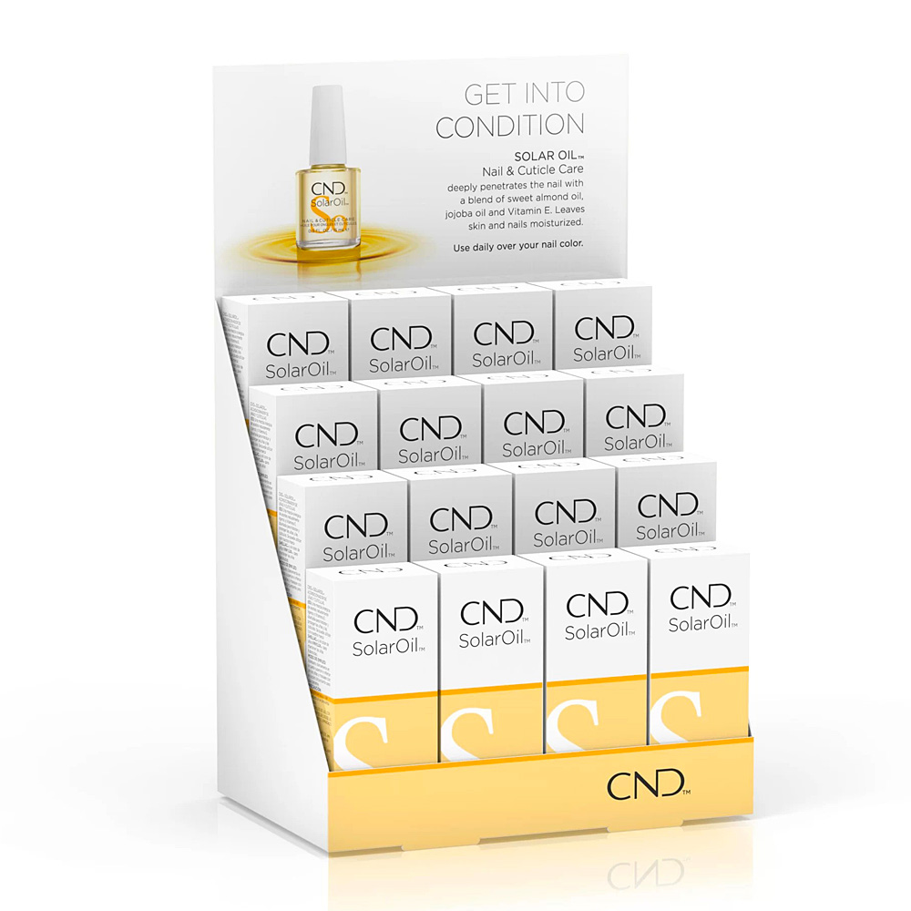 etail display box filled with multiple CND SolarOil Nail & Cuticle Care bottles, advertising that the oil deeply penetrates the nail with a blend of sweet almond oil, jojoba oil, and Vitamin E to leave skin and nails moisturized.