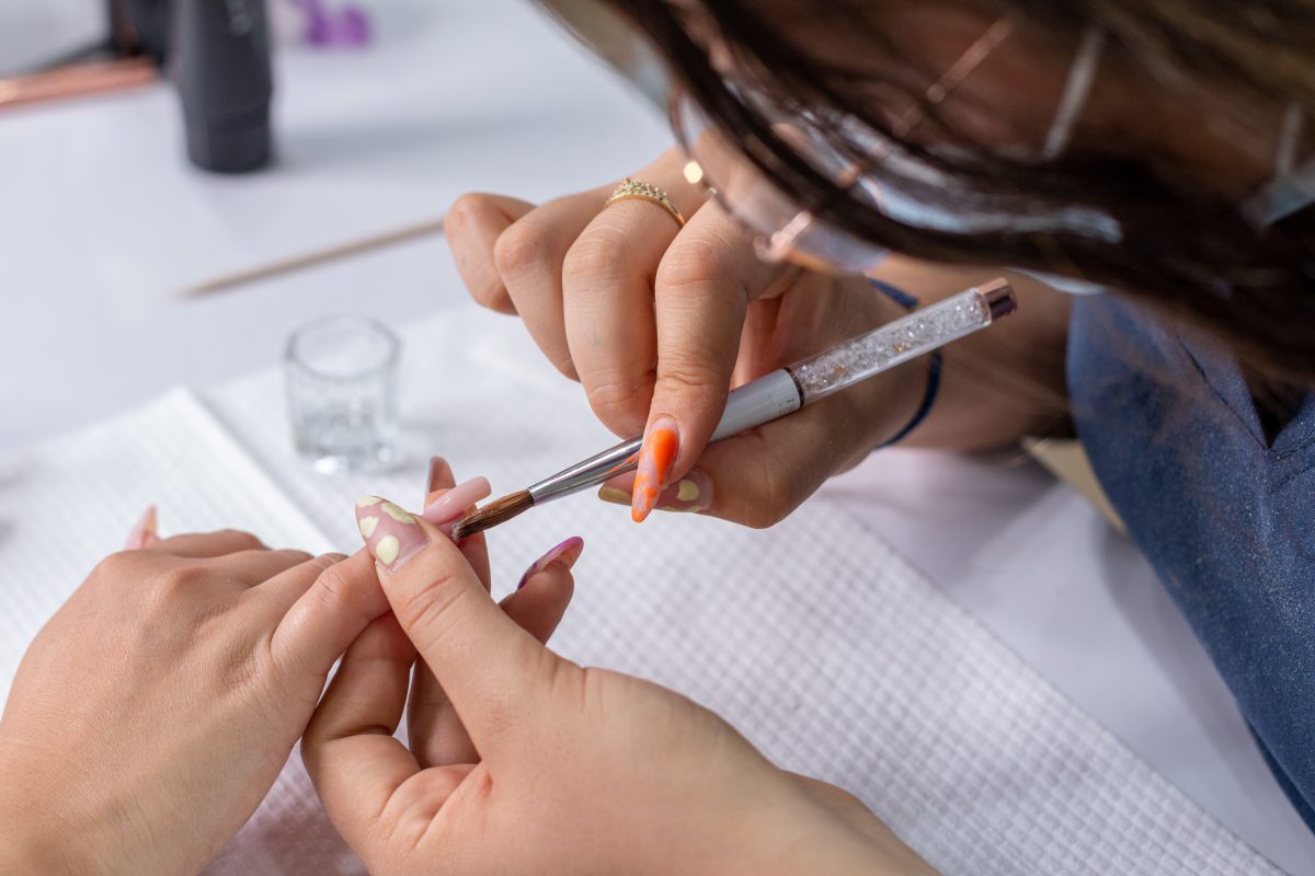 Pricing polygel services by length, shape, and complexity.