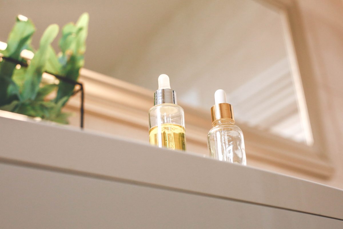 Hair serums at hair salon shelf. Hair treatments.