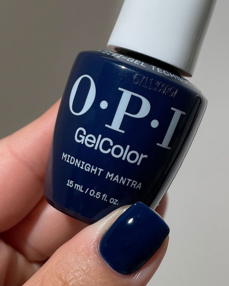 OPI GelColor manicure in a dark navy blue shade.